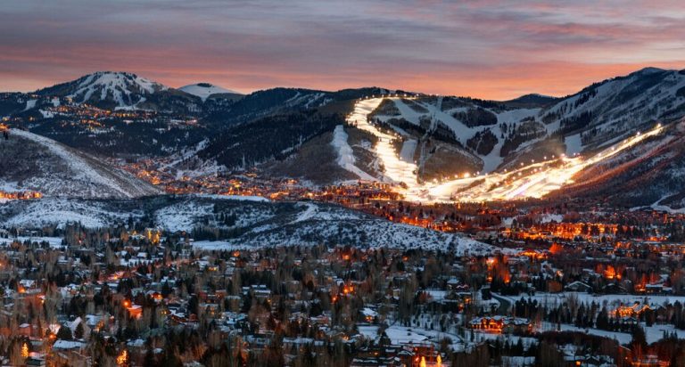Snow Mountains at night with bright lights